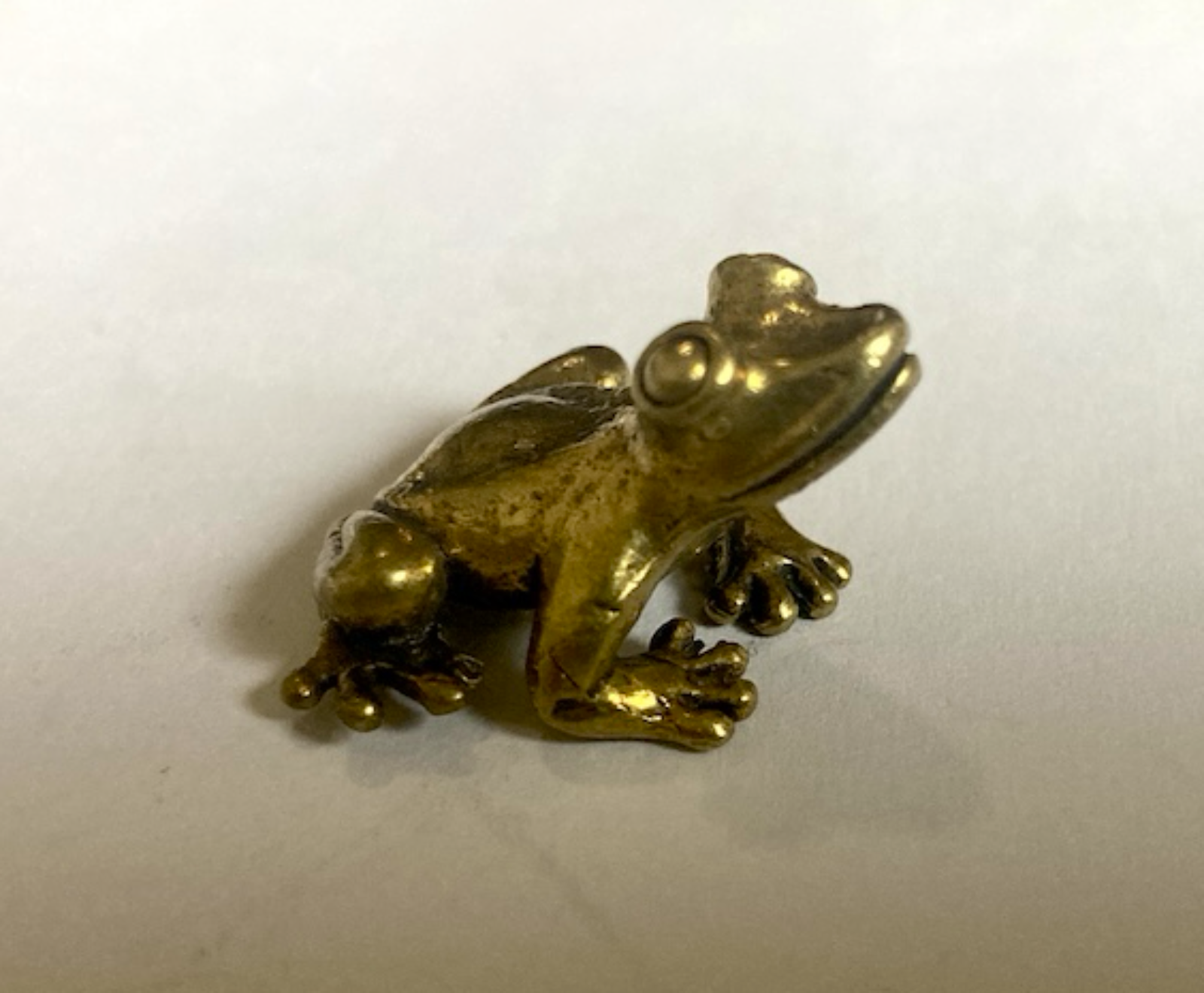 cute brass frog