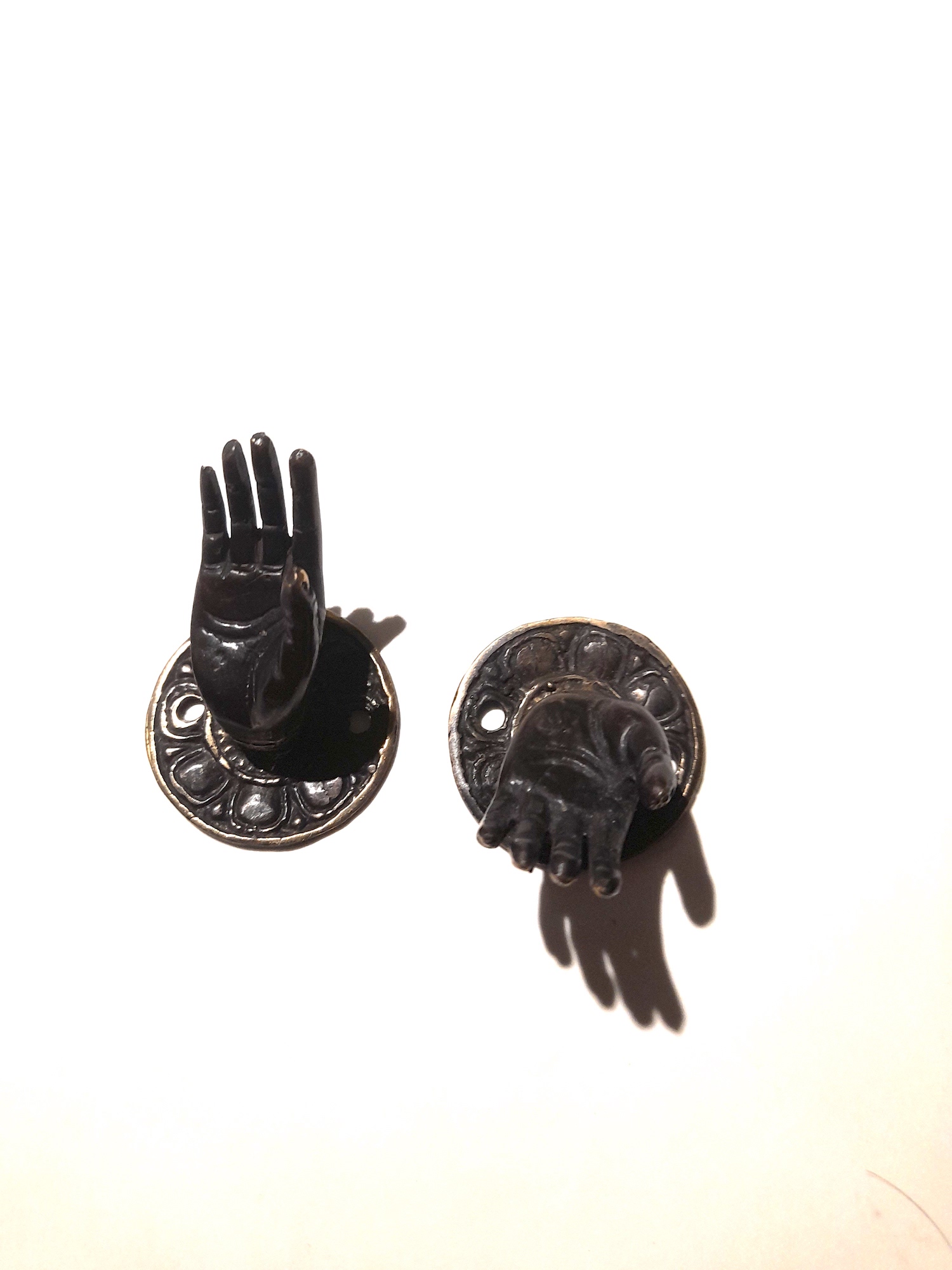 Buddha's hands hooks, cabinet handles, towel rails